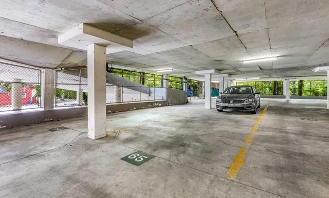 a view of swimming pool with a sitting space