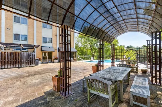 a view of a table and chairs in the patio