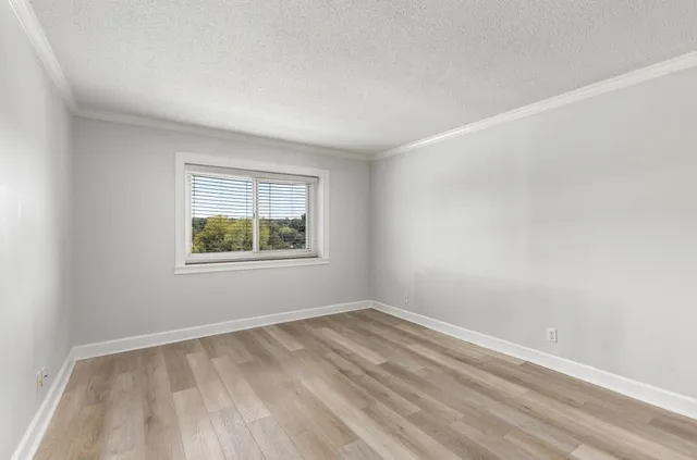 a view of kitchen with wooden floor