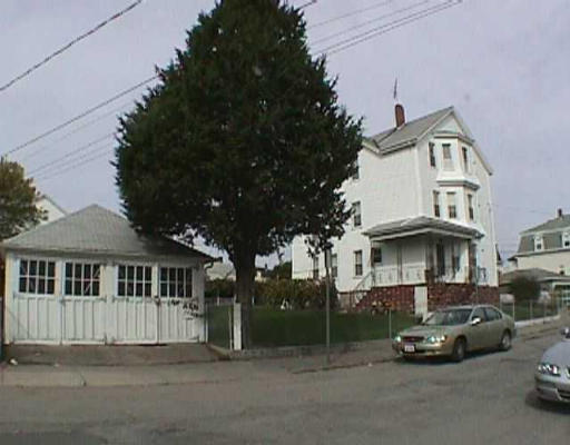 133 Nelson Street Fall River, MA 02721 - Photo 1 of 1 a car parked in front of a white house