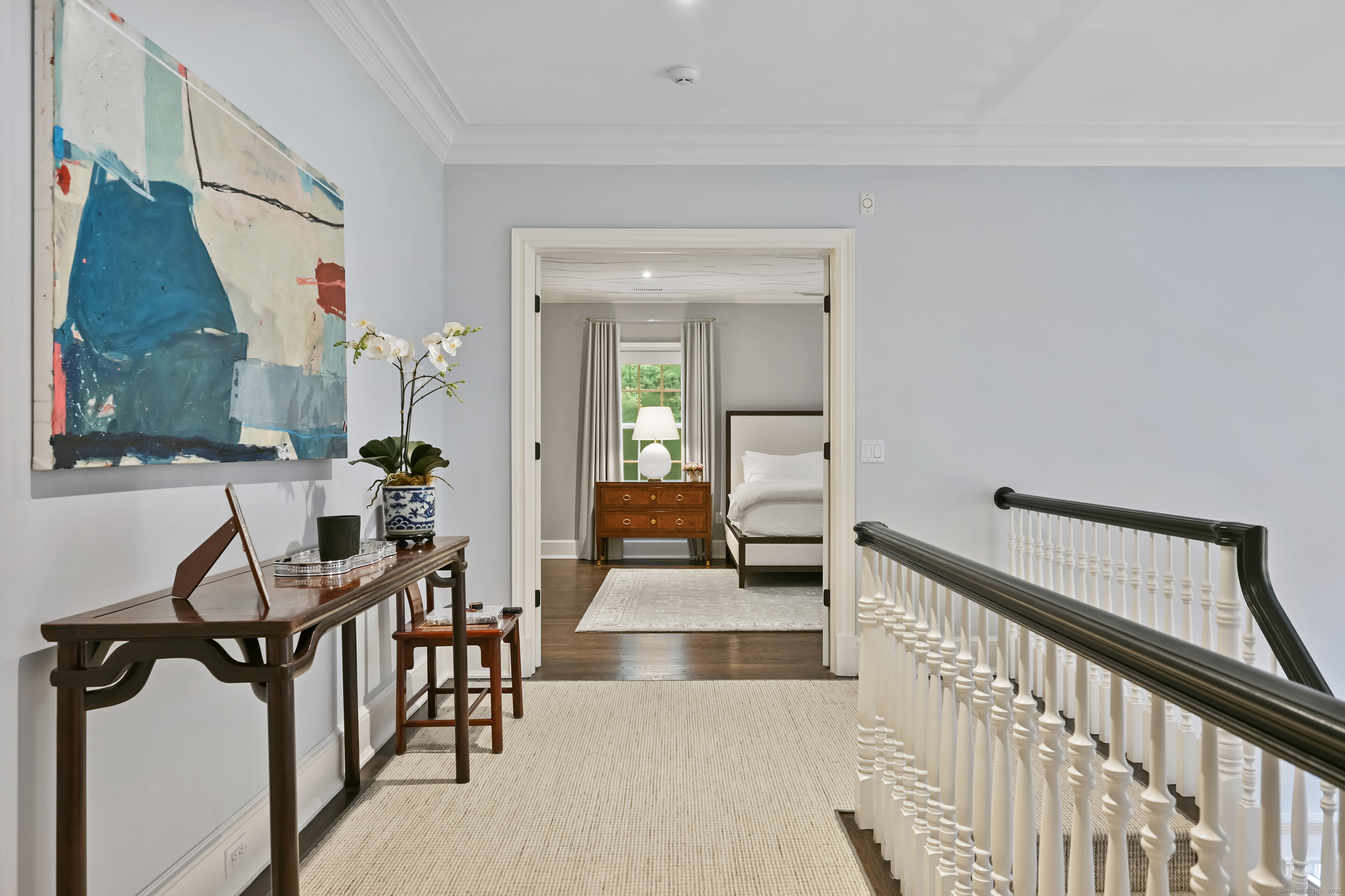 184 Marvin Ridge Road New Canaan, CT 06840 - Photo 16 of 39 a view of a hallway with couches and white walls
