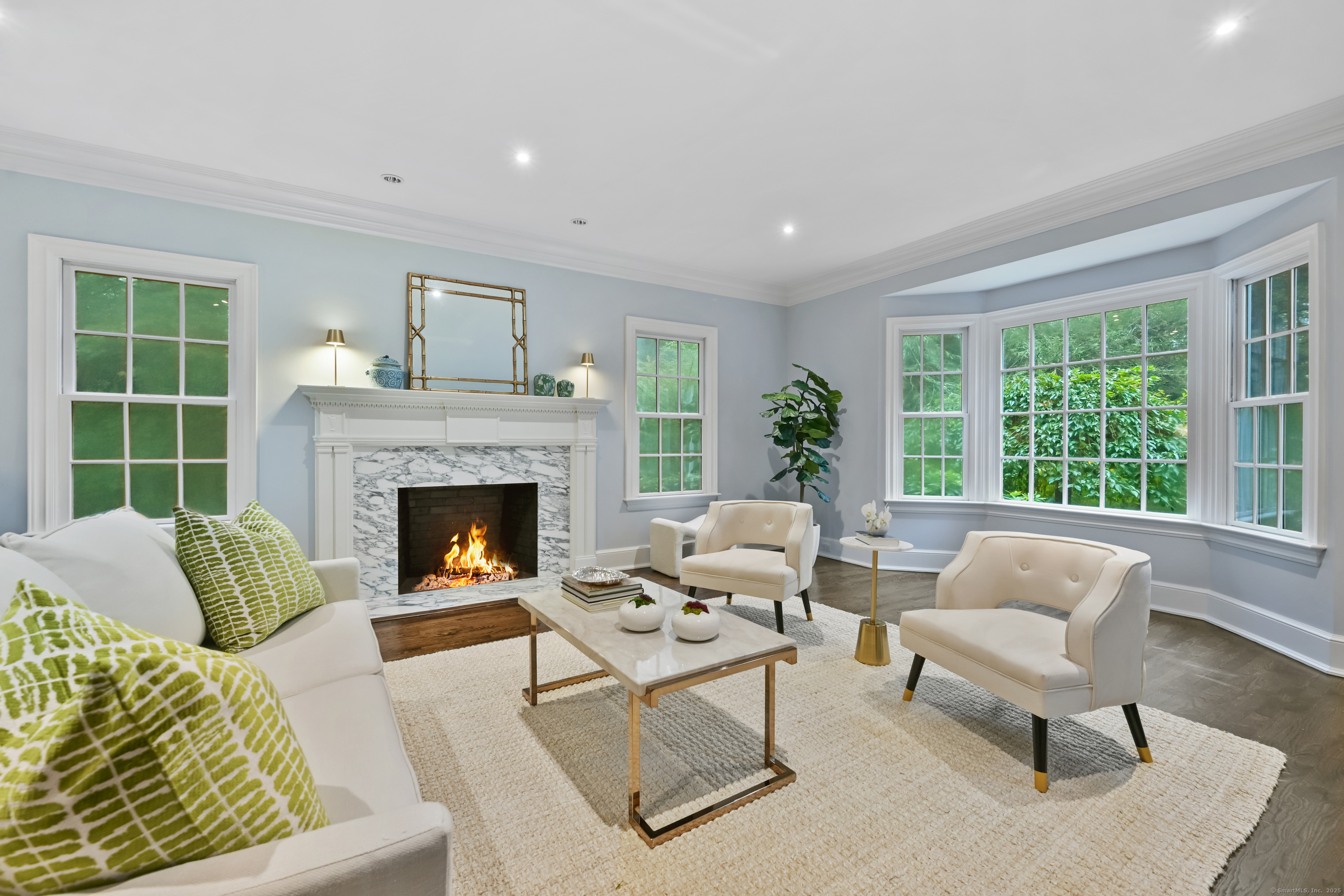 184 Marvin Ridge Road New Canaan, CT 06840 - Photo 5 of 39 a living room with furniture and a fireplace