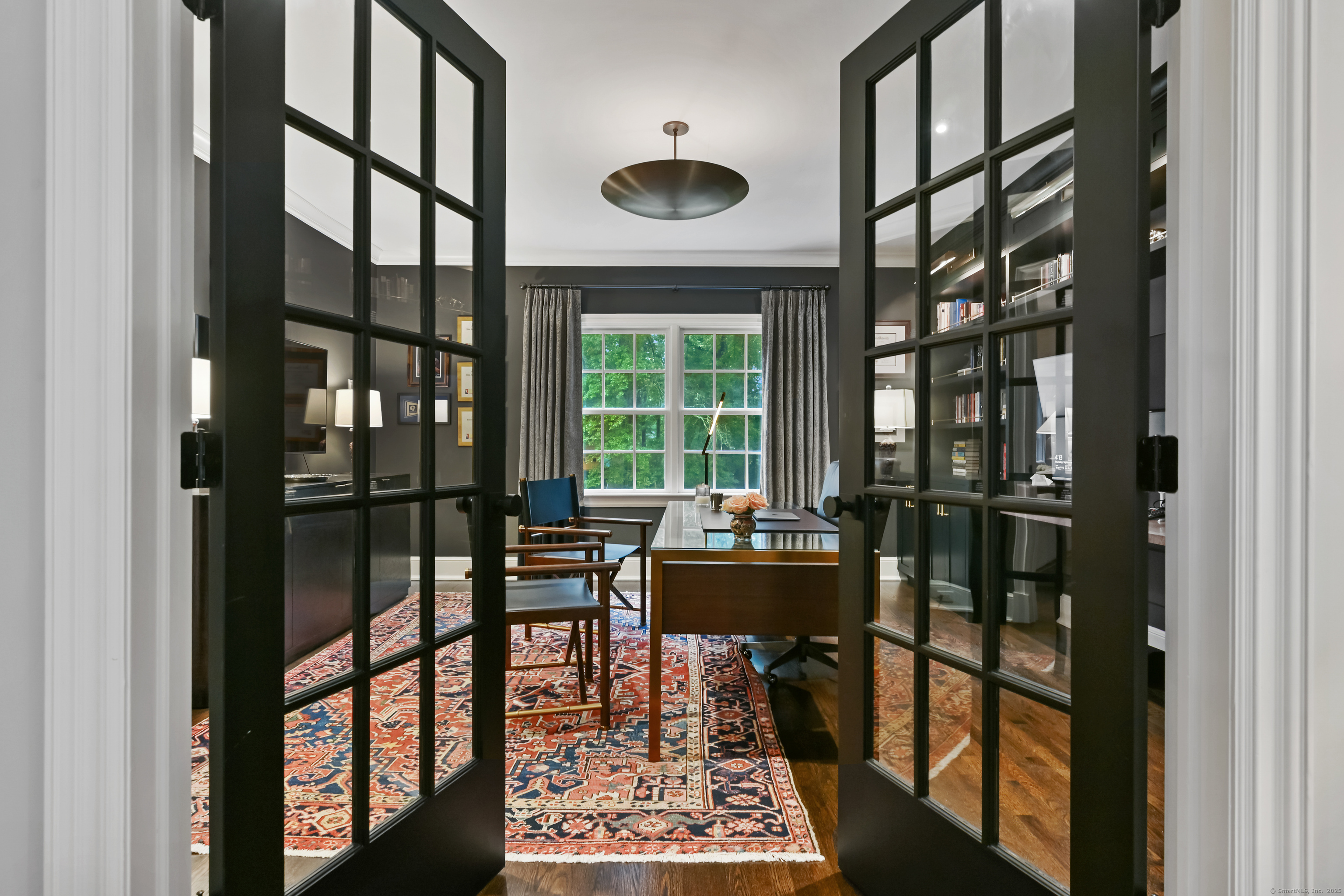 184 Marvin Ridge Road New Canaan, CT 06840 - Photo 6 of 39 a living room with furniture and a floor to ceiling window