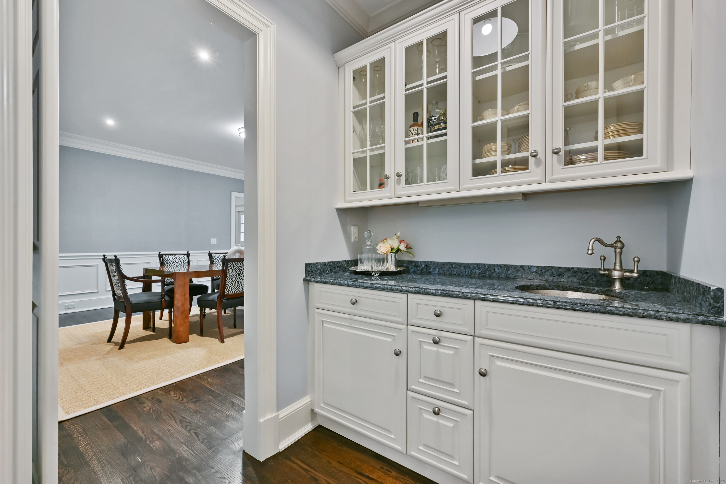 184 Marvin Ridge Road New Canaan, CT 06840 - Photo 10 of 39 a kitchen with granite countertop white cabinets and appliances
