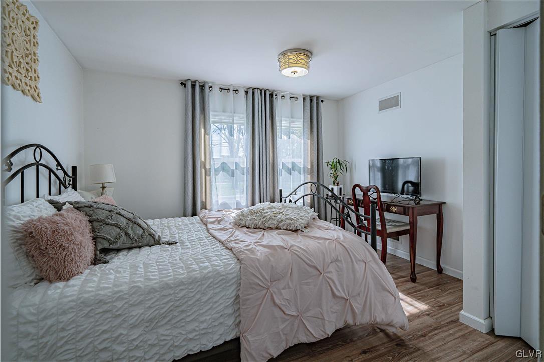 6251 Locust Road Bath, PA 18014 - Photo 17 of 42 a bedroom with a bed and a table in it