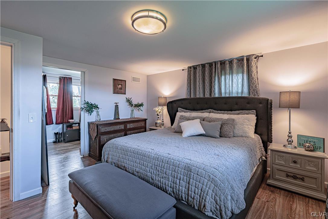 6251 Locust Road Bath, PA 18014 - Photo 24 of 42 a bedroom with a bed and wooden floor