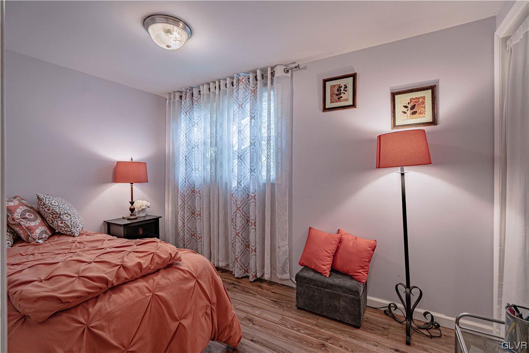 6251 Locust Road Bath, PA 18014 - Photo 29 of 42 a bedroom with a bed and wooden floor
