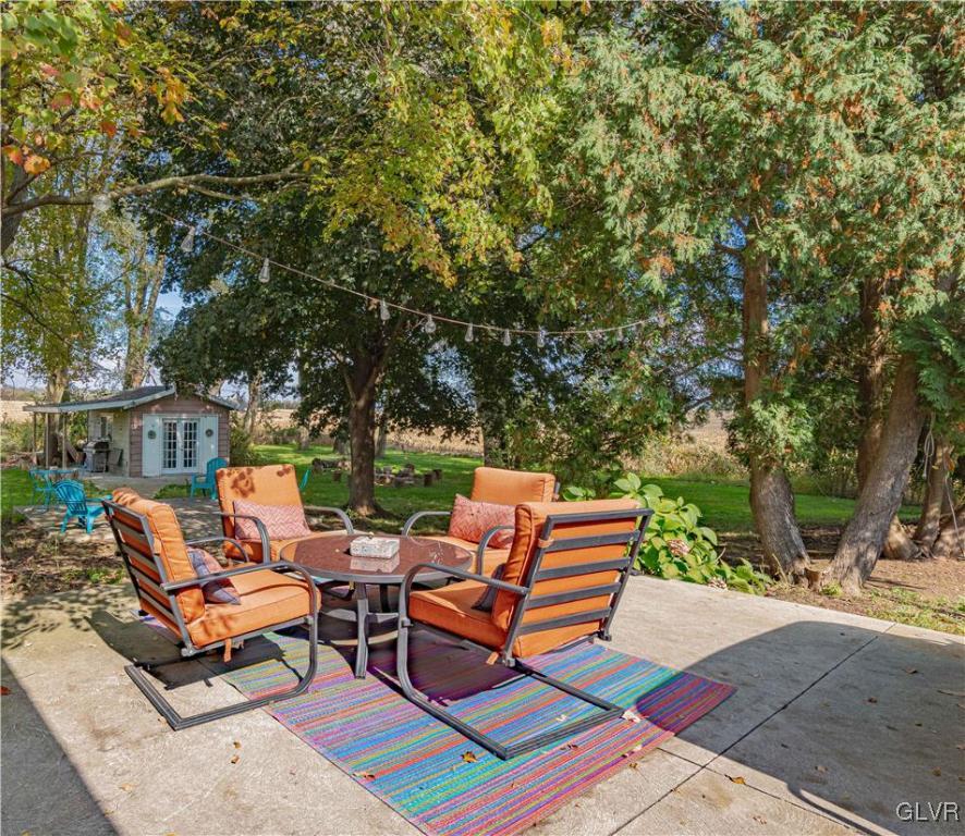 6251 Locust Road Bath, PA 18014 - Photo 31 of 42 a backyard of a house with couple of trees