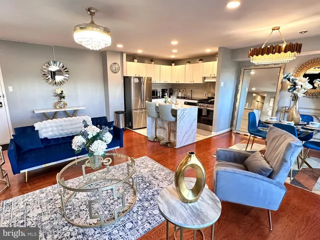 a view of a swimming pool with an outdoor space and seating area