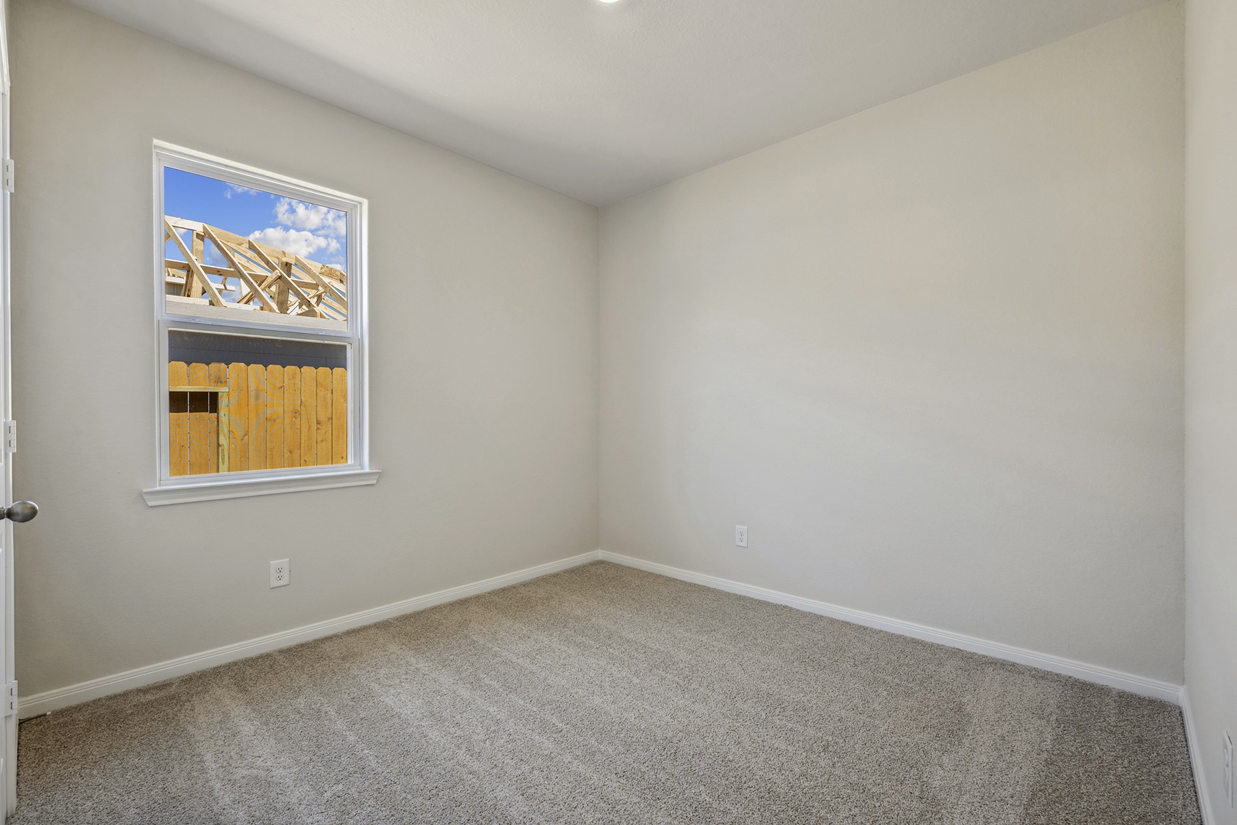 10366 Red Cardinal Drive Cleveland, TX 77328 - Photo 14 of 21 an empty room with windows