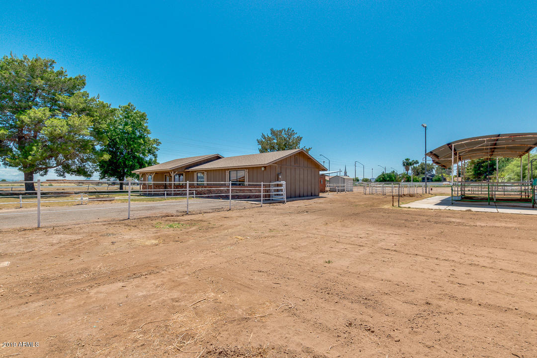 2377 East Willis Road Gilbert, AZ 85297 - Photo 2 of 11 a front view of a house with a yard