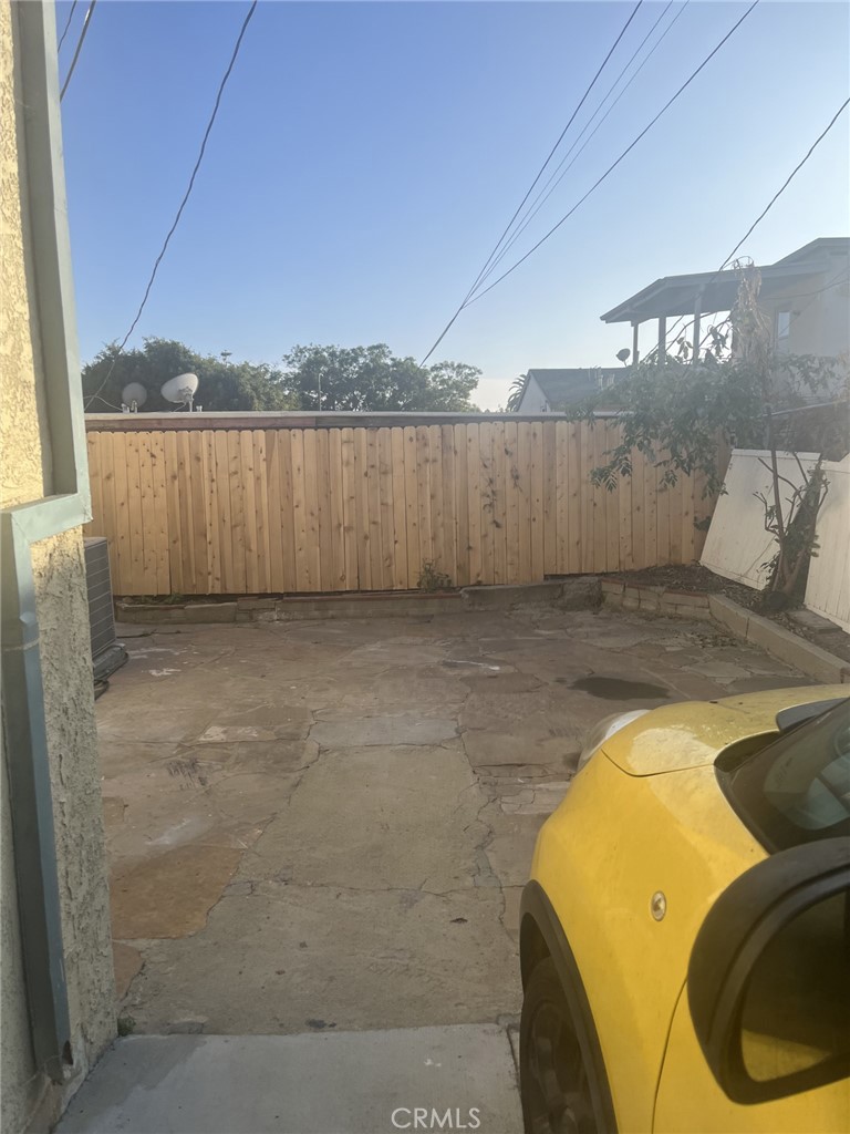 1915-1917 South Orange Drive Los Angeles, CA 90016 - Photo 11 of 11 a view of a swimming pool and lake from inside of room