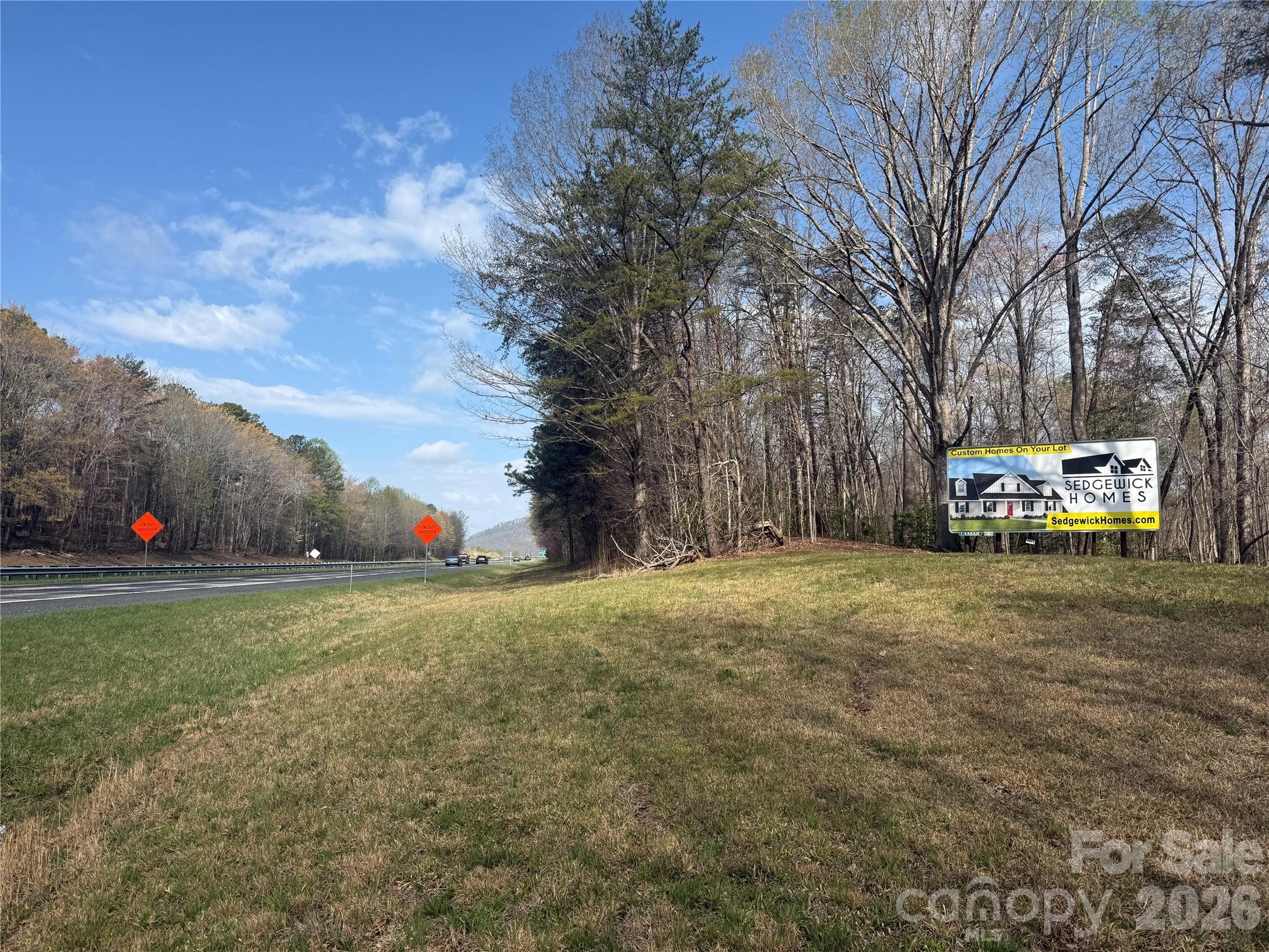 1164 Robert C Kellam Road Pinnacle, NC 27043 - Photo 40 of 48 a front view of a house with a yard and trees