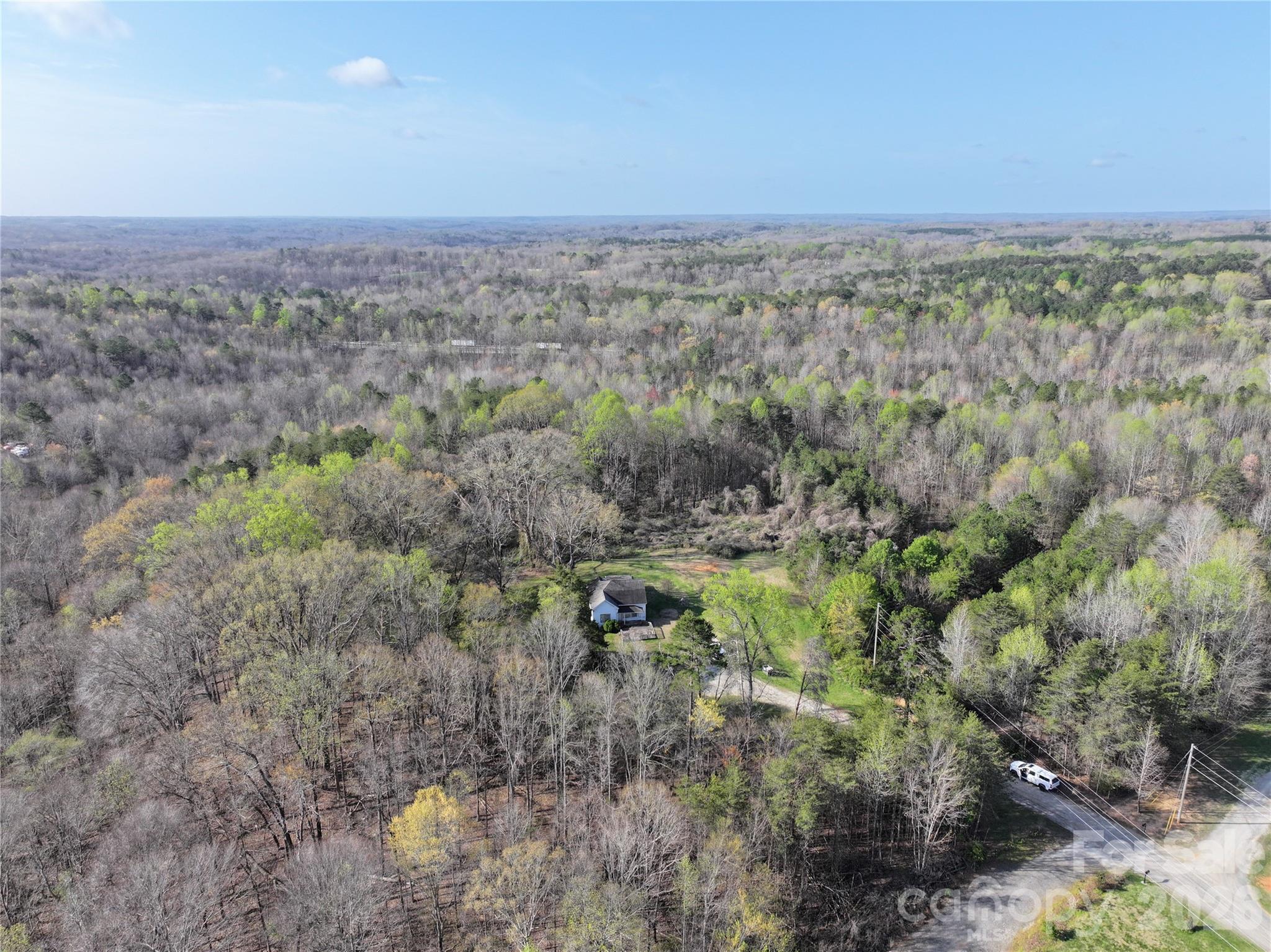 1164 Robert C Kellam Road Pinnacle, NC 27043 - Photo 9 of 48 a view of a green field
