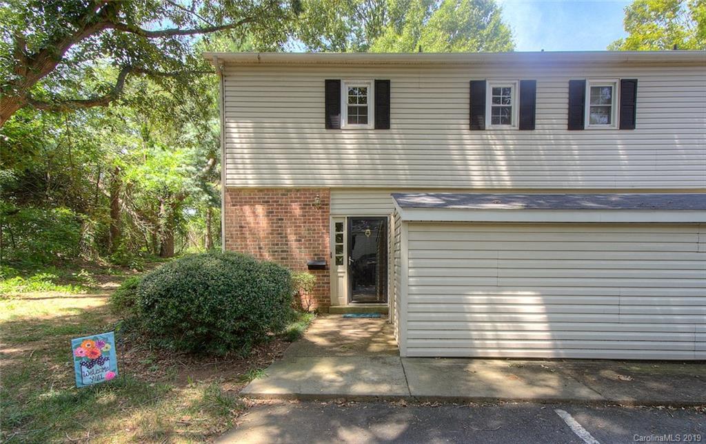 5941 Quail Hollow Road, Unit A Charlotte, NC 28210 - Photo 1 of 26 a view of a house with a yard