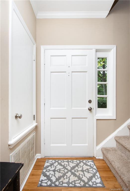 5941 Quail Hollow Road, Unit A Charlotte, NC 28210 - Photo 15 of 26 a bathroom with a window and a shower