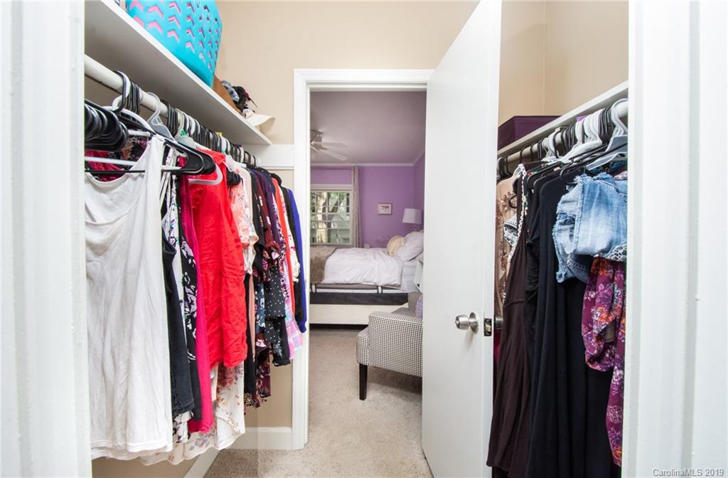 5941 Quail Hollow Road, Unit A Charlotte, NC 28210 - Photo 20 of 26 a view of walk in closet with clothes and shoes