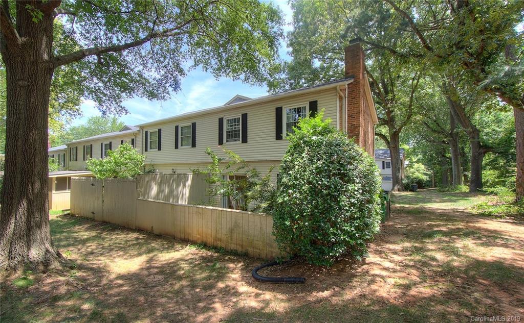 5941 Quail Hollow Road, Unit A Charlotte, NC 28210 - Photo 26 of 26 front view of a house with a yard