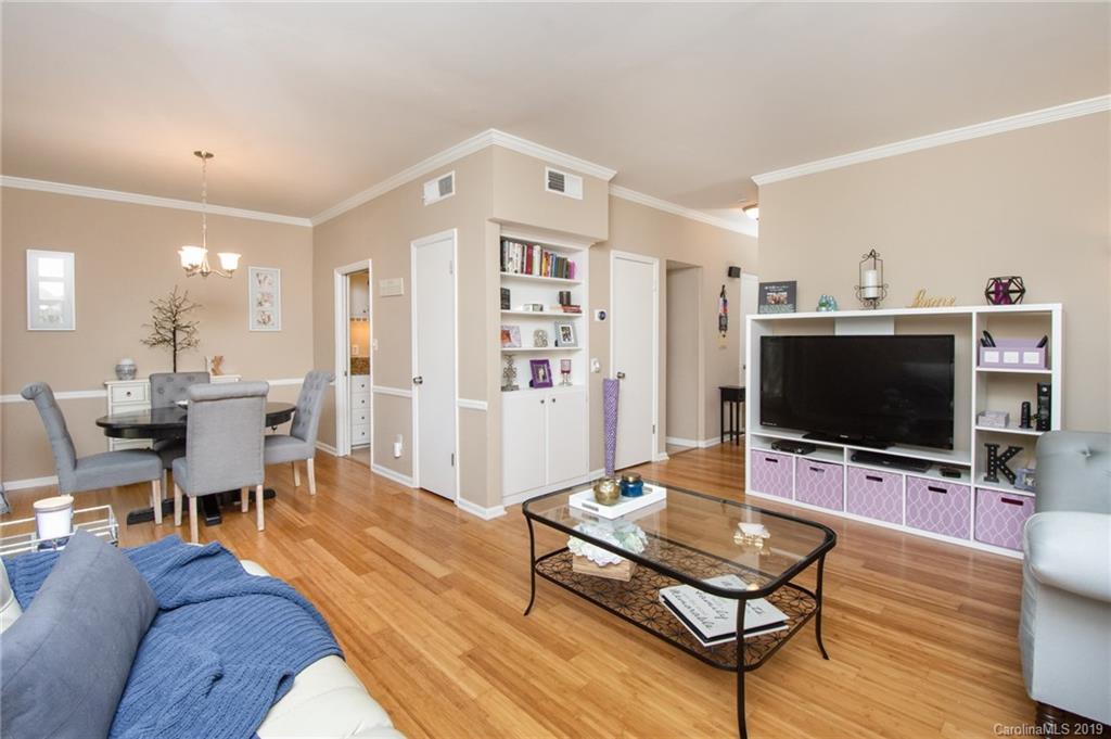 5941 Quail Hollow Road, Unit A Charlotte, NC 28210 - Photo 5 of 26 a living room with furniture and a flat screen tv