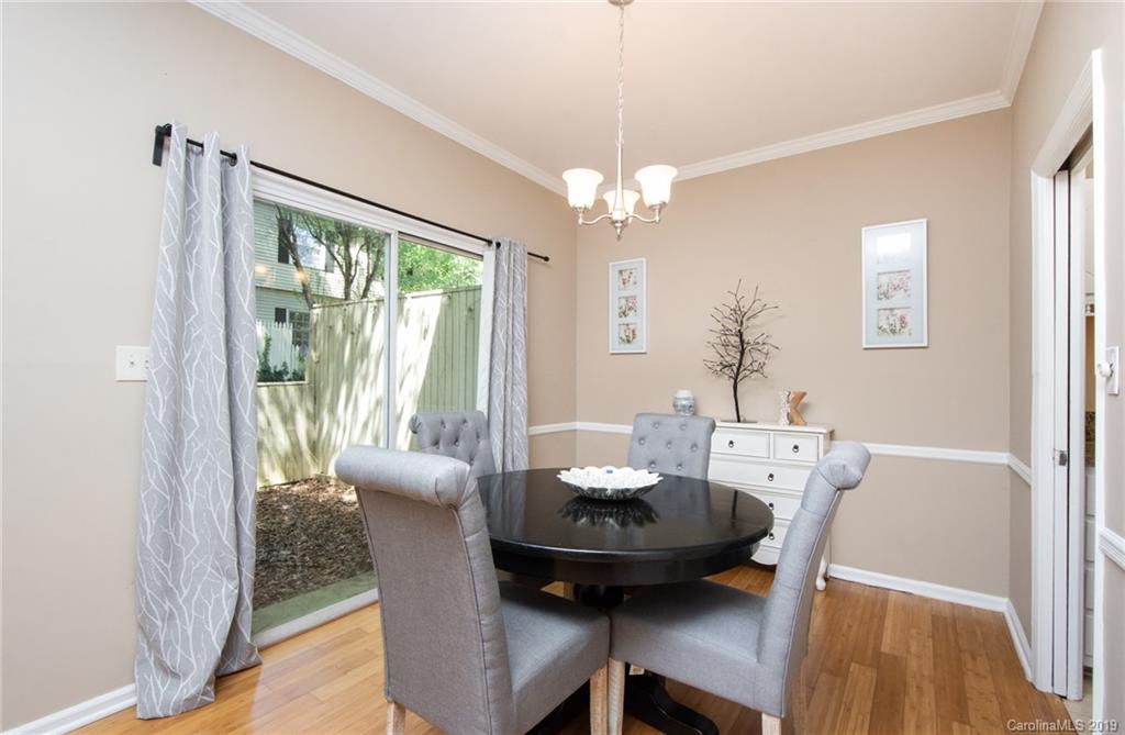 5941 Quail Hollow Road, Unit A Charlotte, NC 28210 - Photo 8 of 26 a view of a dining room with furniture window and outside view