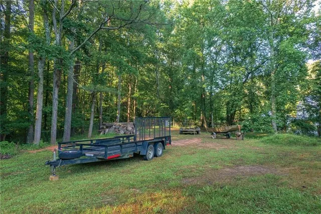 a view of a house with backyard space
