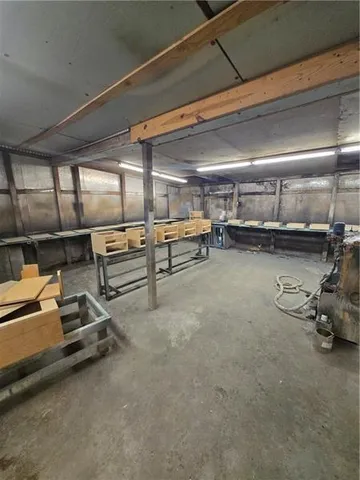 a workspace with furniture and a window