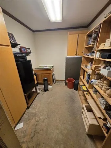 a view of a chairs and table in patio