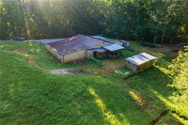 a view of a backyard with a patio