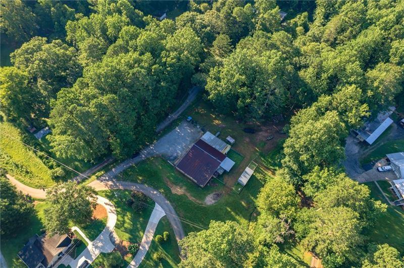 365 Russell King Lane Canton, GA 30115 - Photo 7 of 22 an aerial view of residential house with outdoor space and trees all around