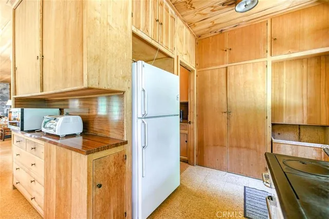 a bathroom with a shower and a sink