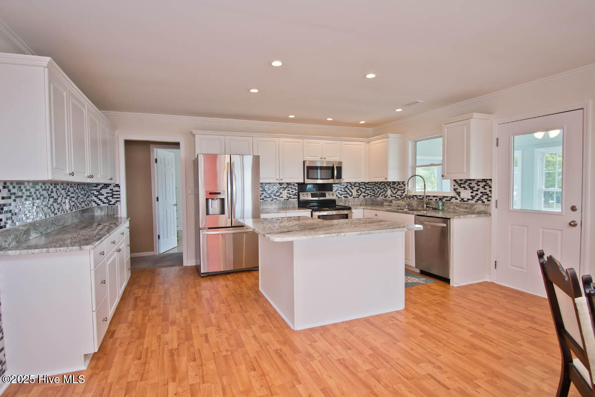 174 Jones Street Cedar Point, NC 28584 - Photo 15 of 52 Dining to Kitchen