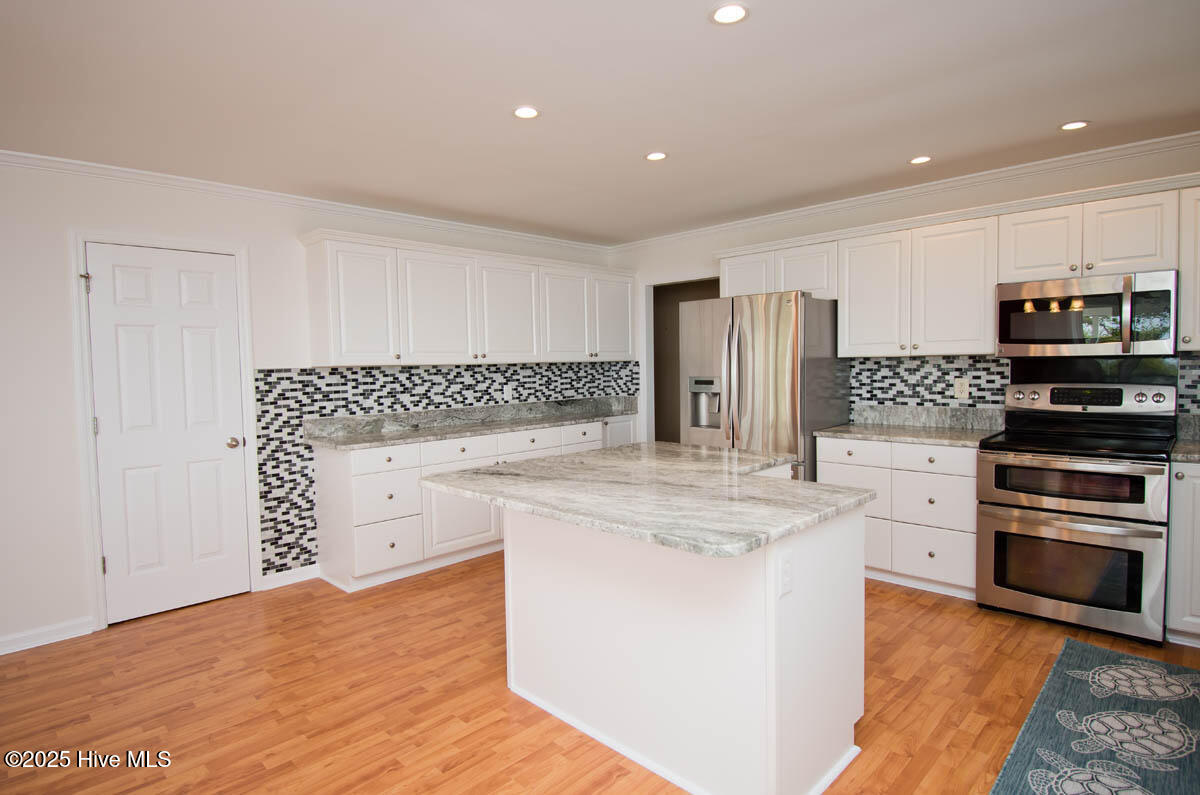 174 Jones Street Cedar Point, NC 28584 - Photo 17 of 52 Kitchen Island & Pantry