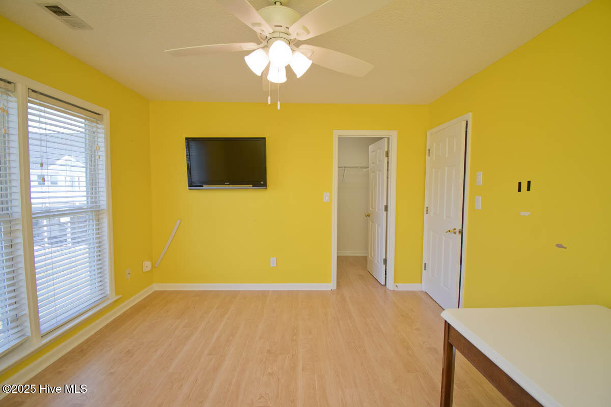 174 Jones Street Cedar Point, NC 28584 - Photo 34 of 52 Bedroom 3 with Walk-in Closet