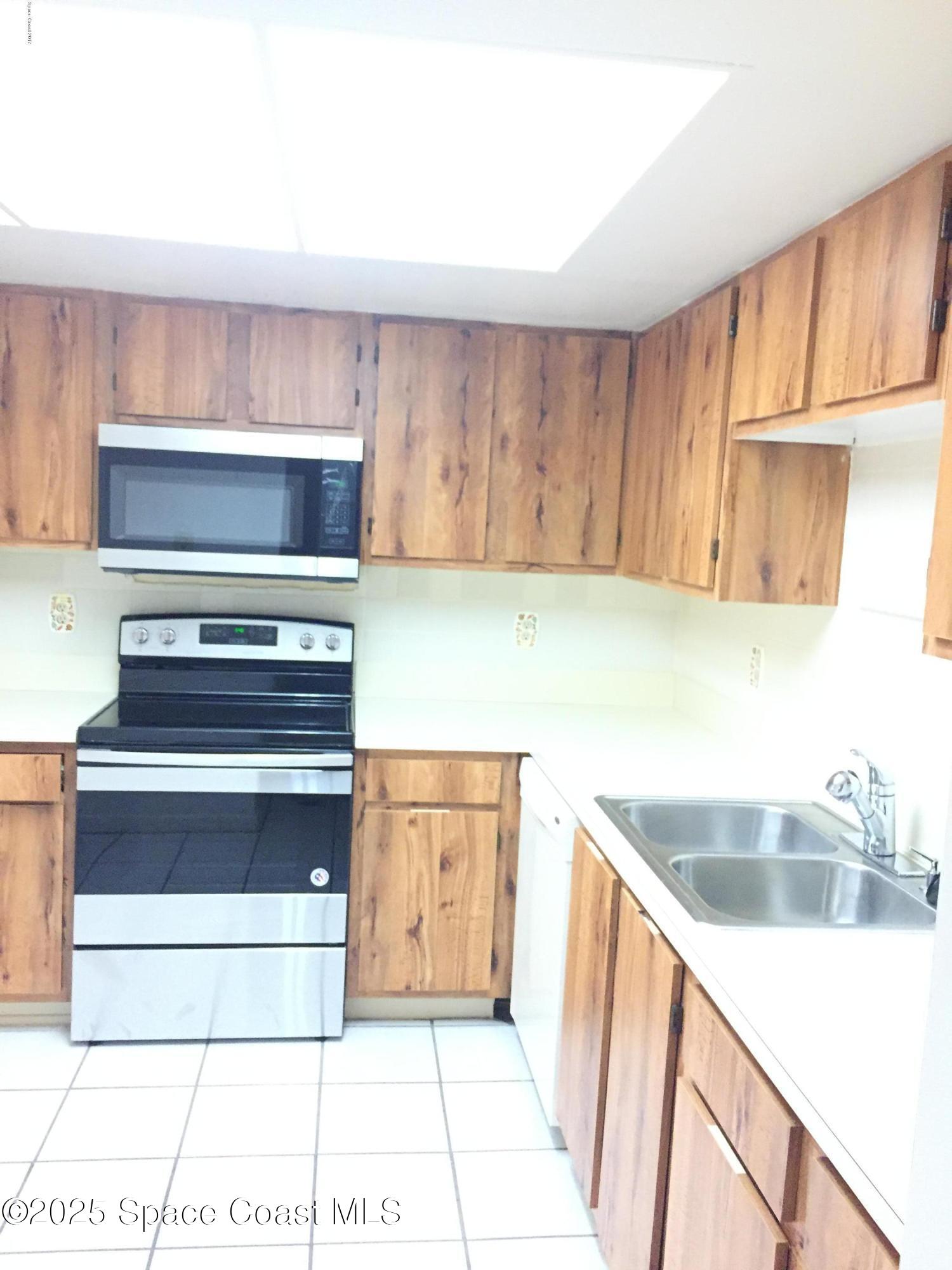 3213 Murrell Road, Unit 207 Rockledge, FL 32955 - Photo 2 of 15 KITCHEN 4