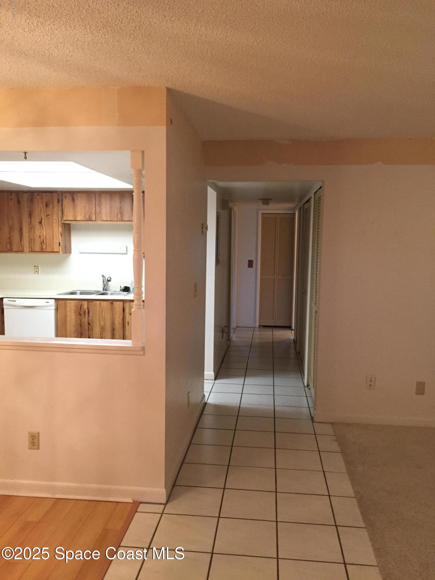 3213 Murrell Road, Unit 207 Rockledge, FL 32955 - Photo 3 of 15 HALLWAY