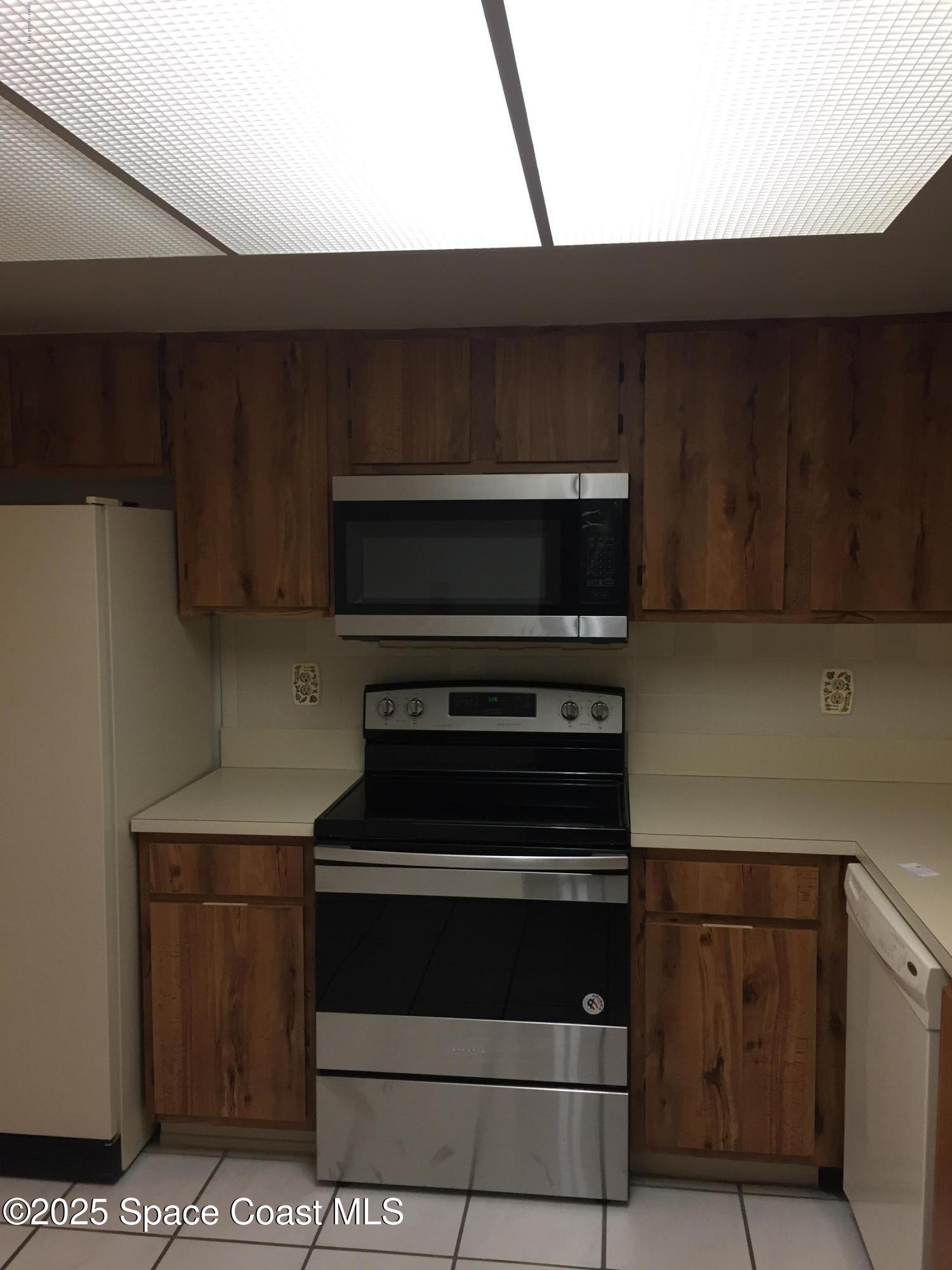 3213 Murrell Road, Unit 207 Rockledge, FL 32955 - Photo 5 of 15 KITCHEN 2