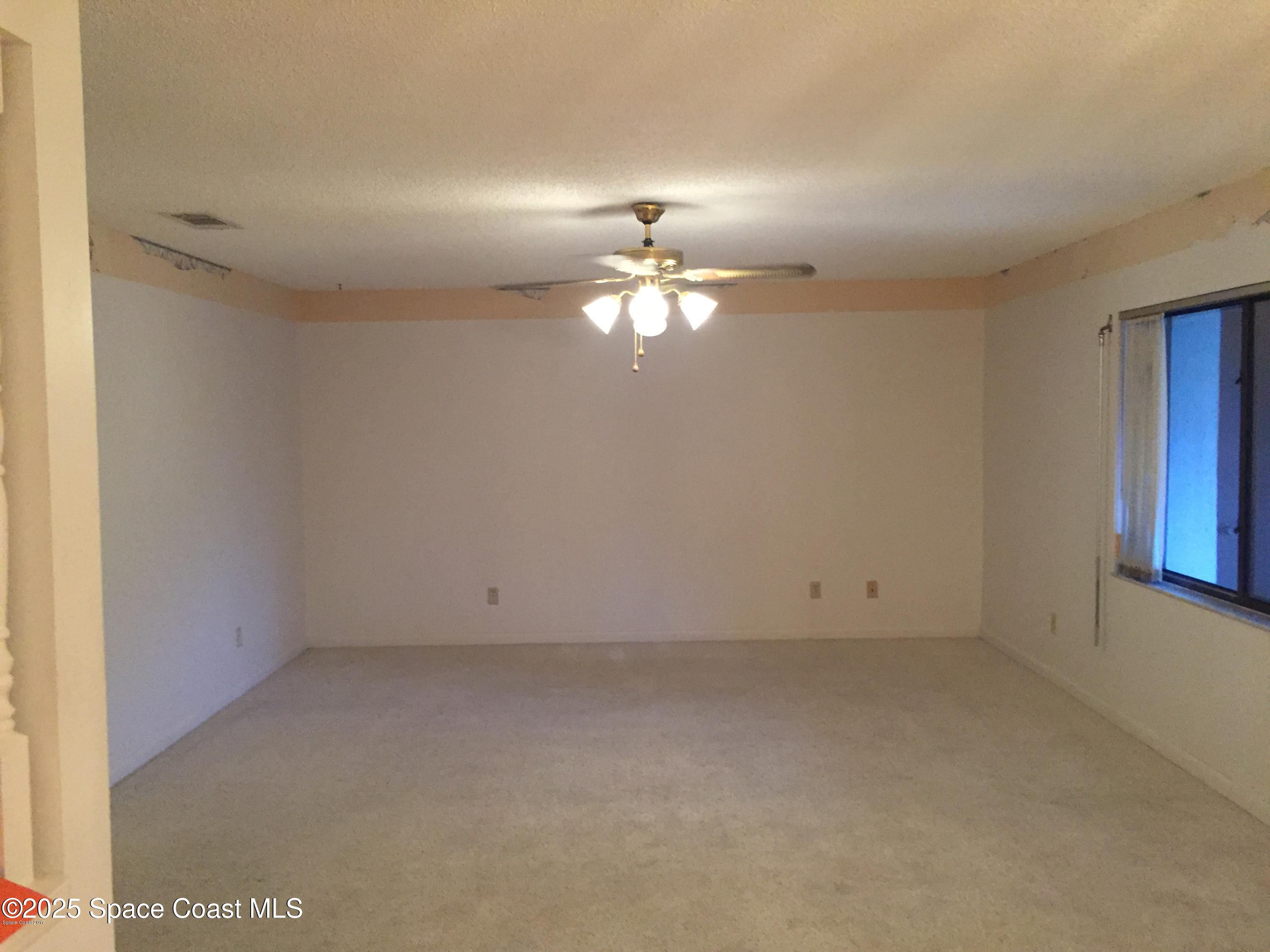 3213 Murrell Road, Unit 207 Rockledge, FL 32955 - Photo 9 of 15 MASTER BEDROOM