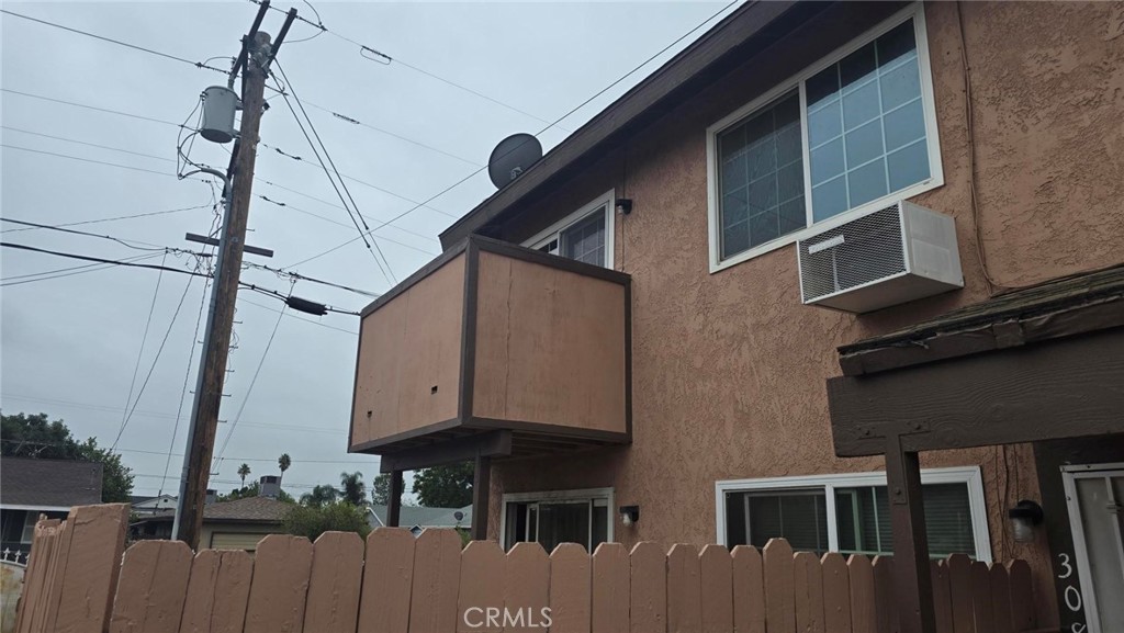 308 North Millard Avenue, Unit 312 Rialto, CA 92376 - Photo 8 of 16 a view of a house with a street