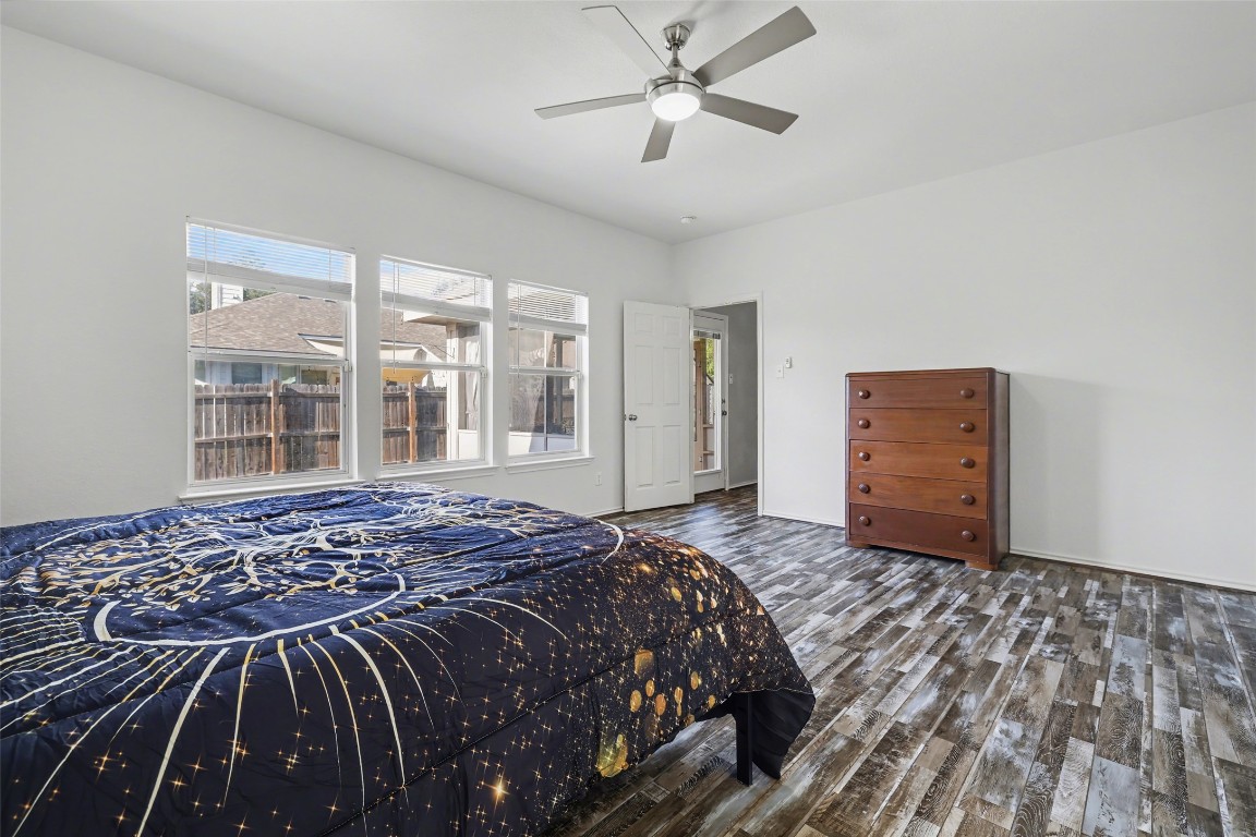 1520 Tonia Loop Round Rock, TX 78665 - Photo 14 of 32 a bedroom with a large bed and a window