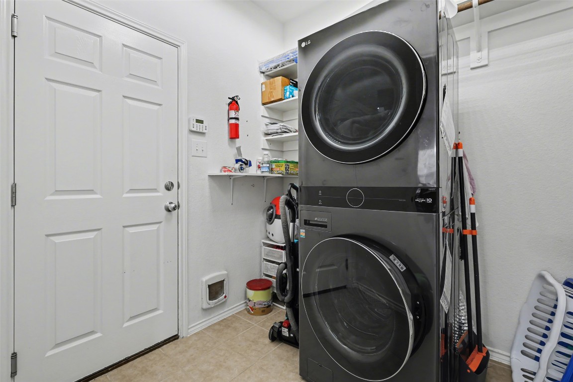1520 Tonia Loop Round Rock, TX 78665 - Photo 26 of 32 a utility room with dryer and washer
