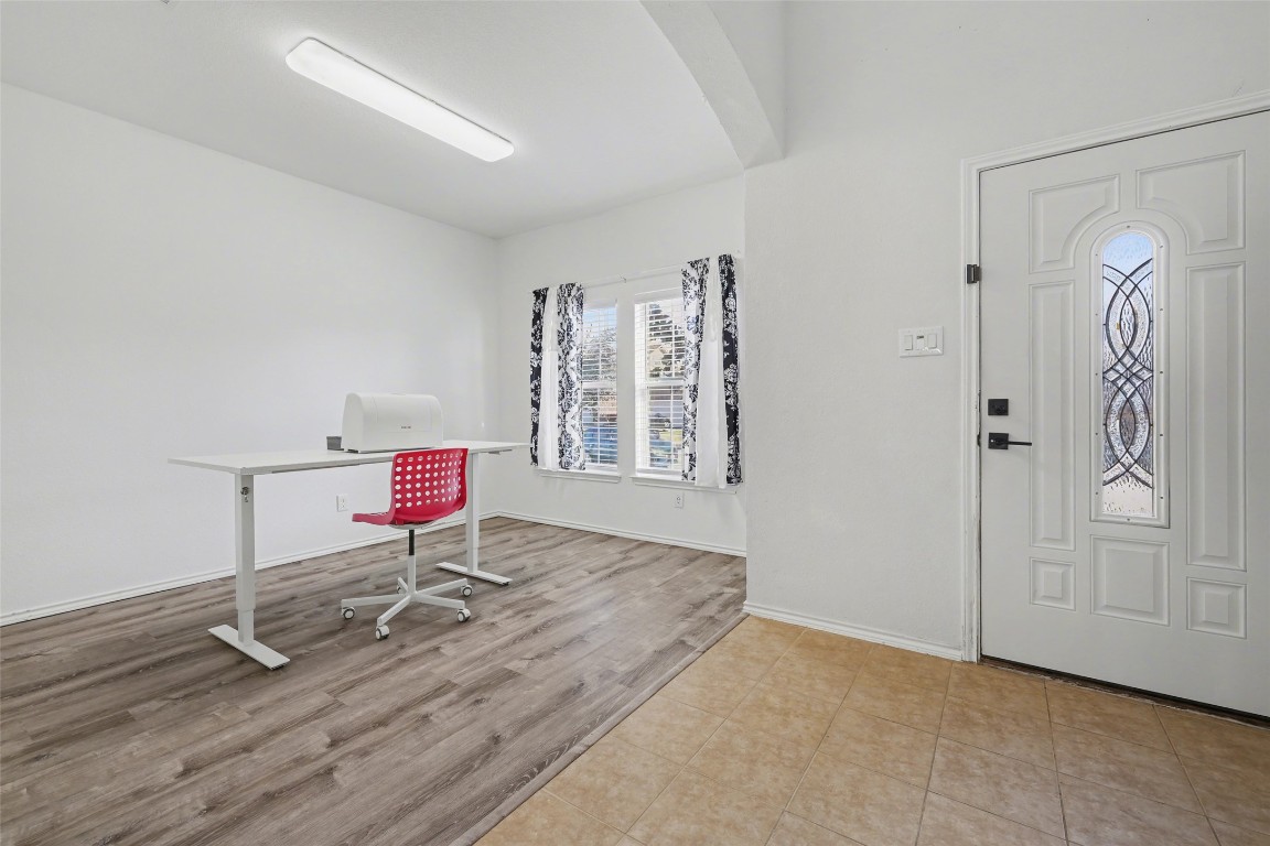 1520 Tonia Loop Round Rock, TX 78665 - Photo 3 of 32 a work room with furniture and wooden floor