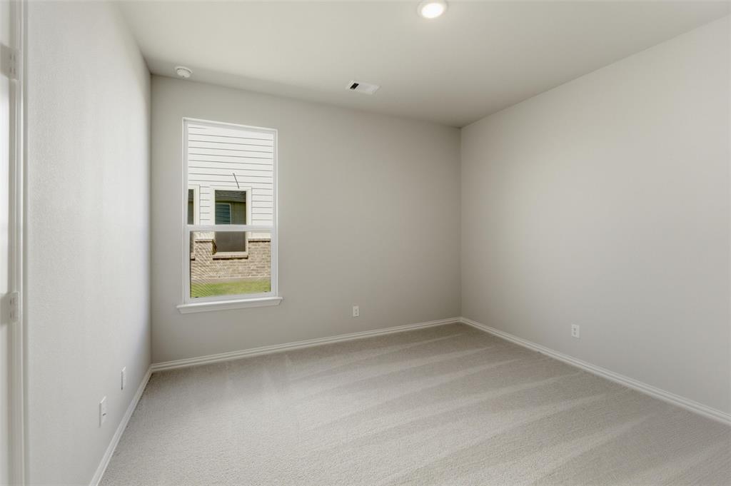 1225 Sabine River Lane Springtown, TX 76082 - Photo 12 of 25 Unfurnished room featuring light carpet and baseboards