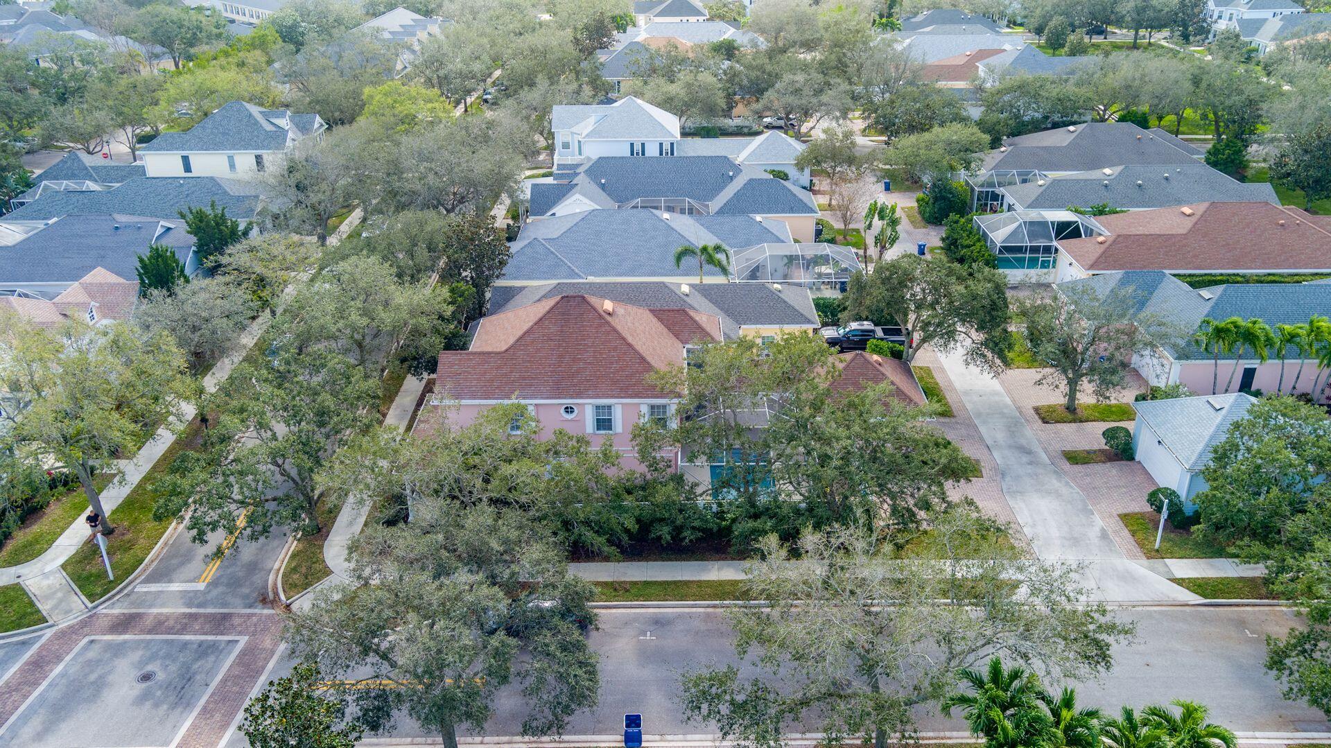 214 New Haven Boulevard Jupiter, FL 33458 - Photo 36 of 40 an aerial view of residential houses with outdoor space and street view