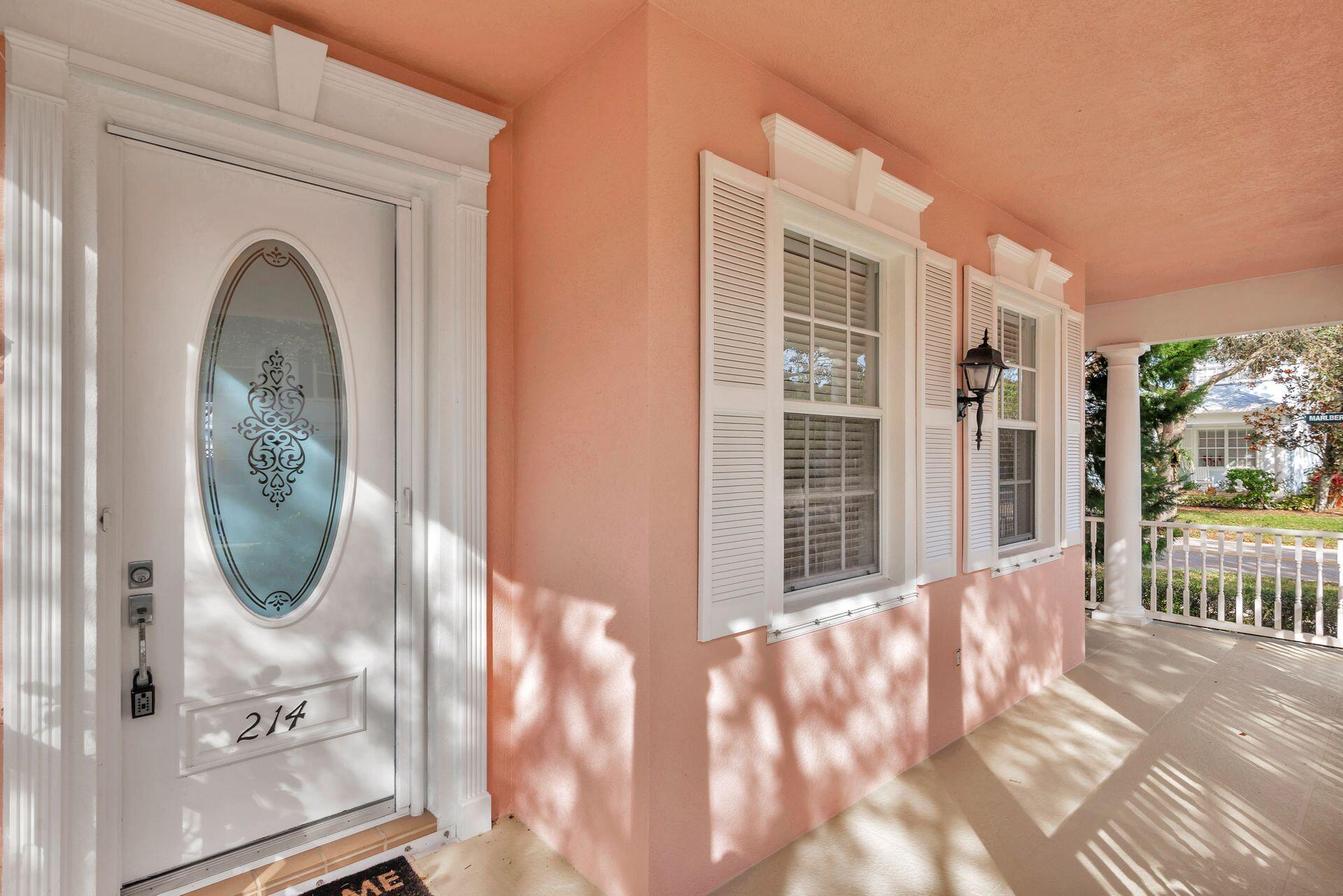214 New Haven Boulevard Jupiter, FL 33458 - Photo 5 of 40 a view of a house with a door and windows