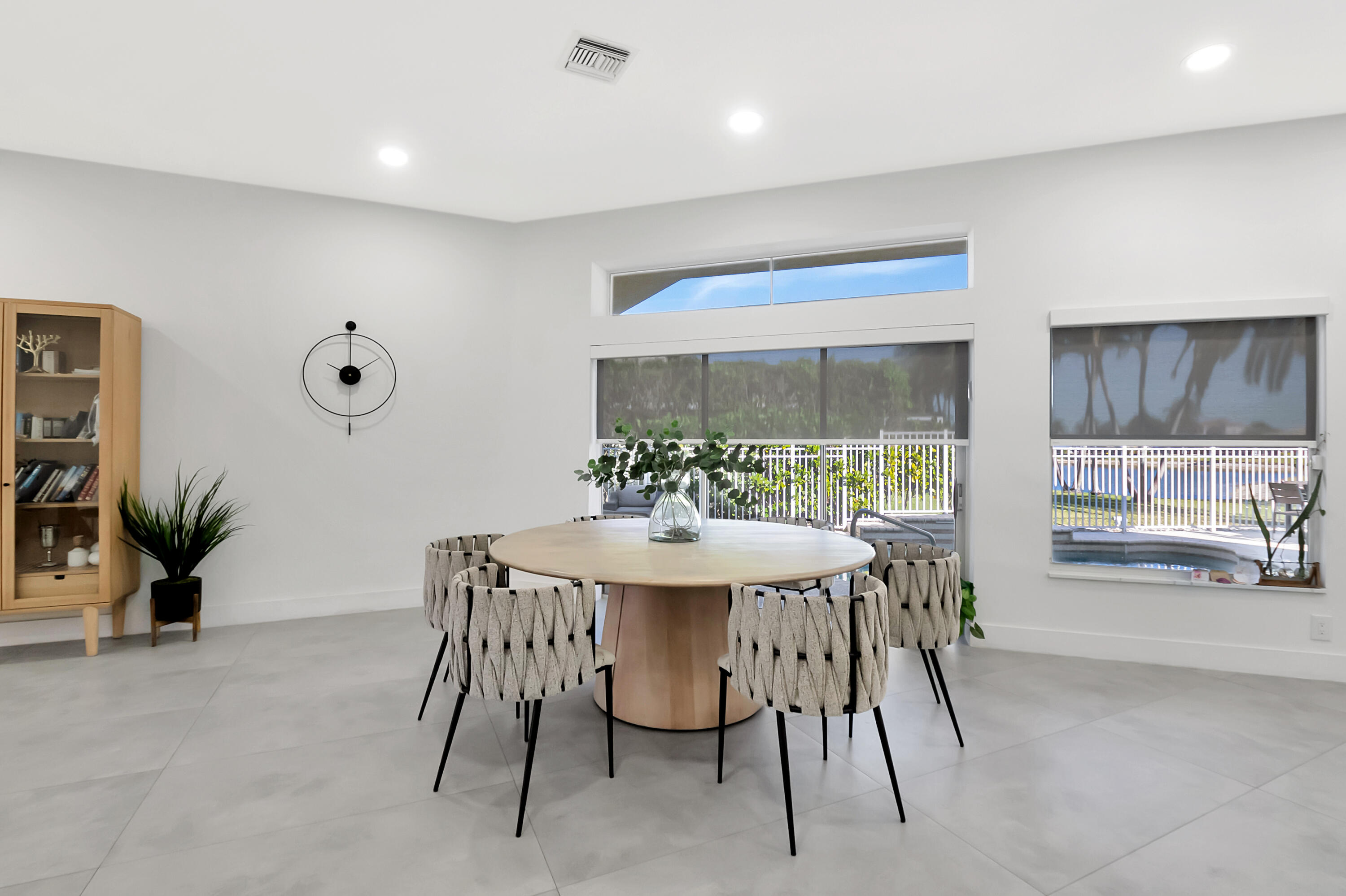 22330 Kettle Creek Way Boca Raton, FL 33428 - Photo 18 of 75 a view of a dining room with furniture and a large window