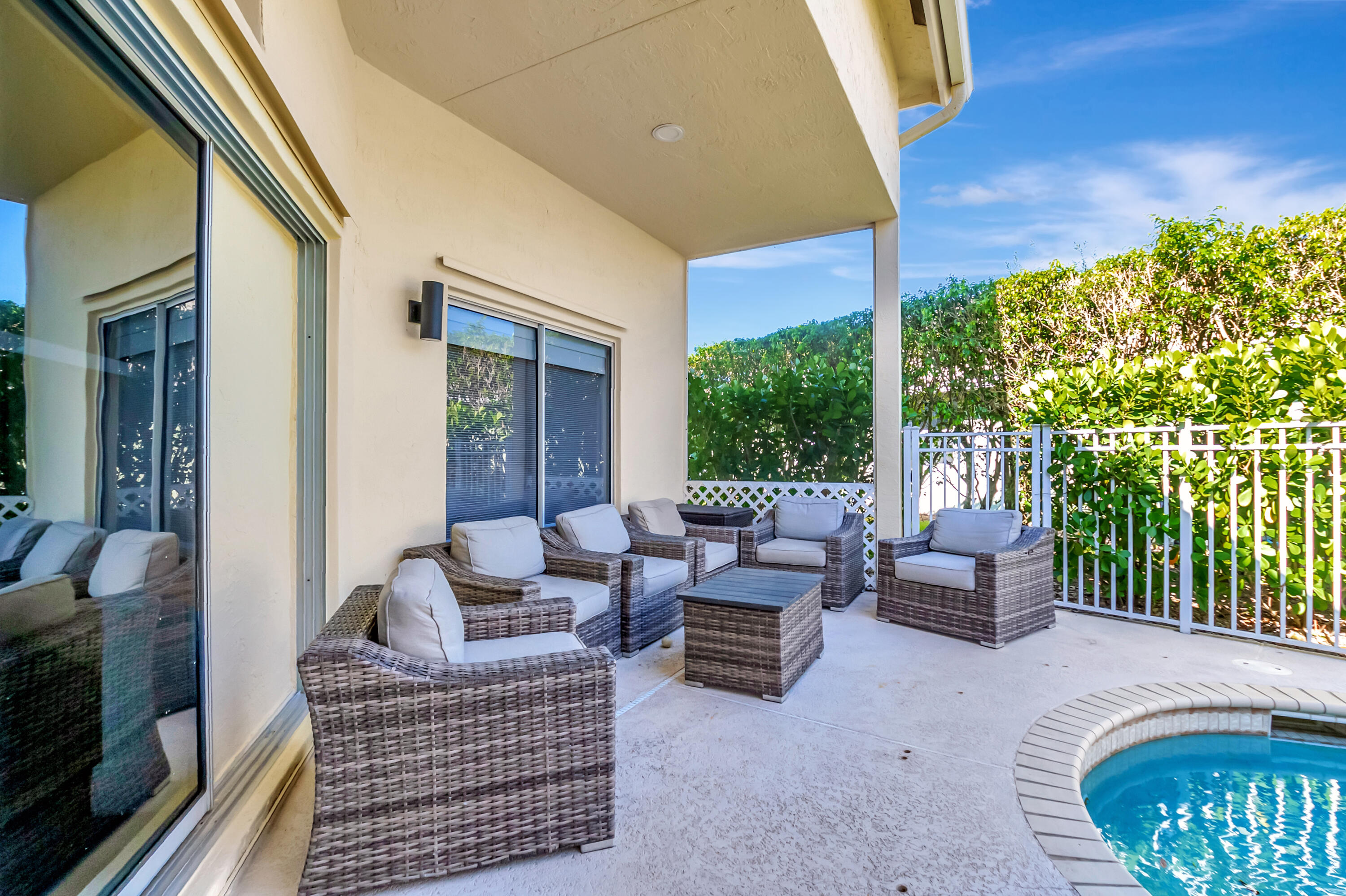 22330 Kettle Creek Way Boca Raton, FL 33428 - Photo 24 of 75 a living room with furniture and a floor to ceiling window