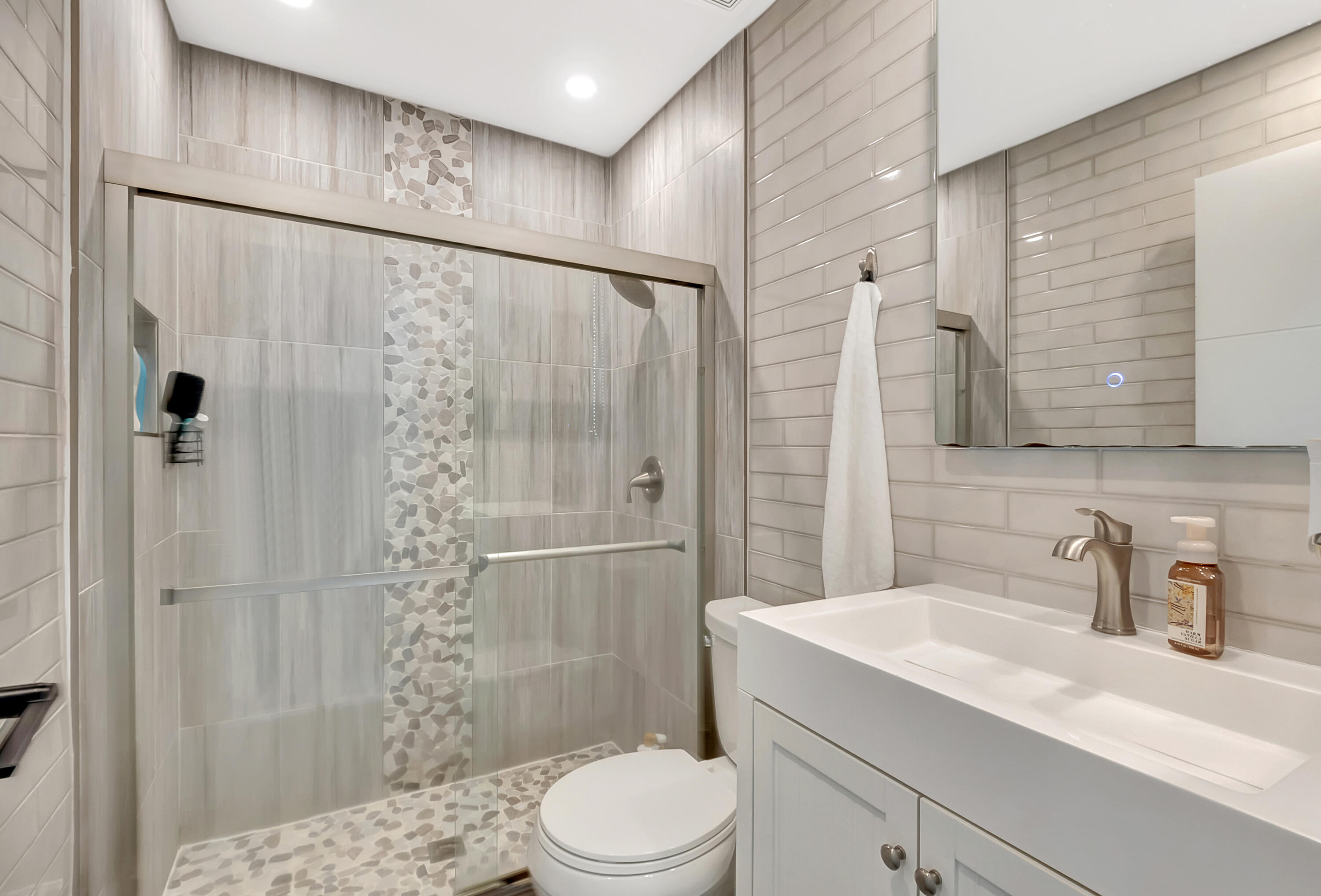 22330 Kettle Creek Way Boca Raton, FL 33428 - Photo 34 of 75 a bathroom with a sink a toilet and shower