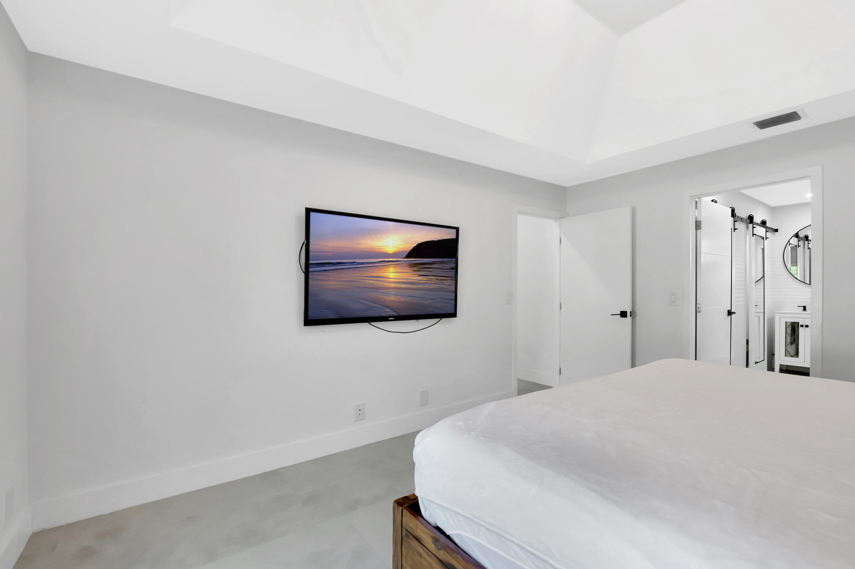 22330 Kettle Creek Way Boca Raton, FL 33428 - Photo 36 of 75 a bedroom with a bed and a flat screen tv