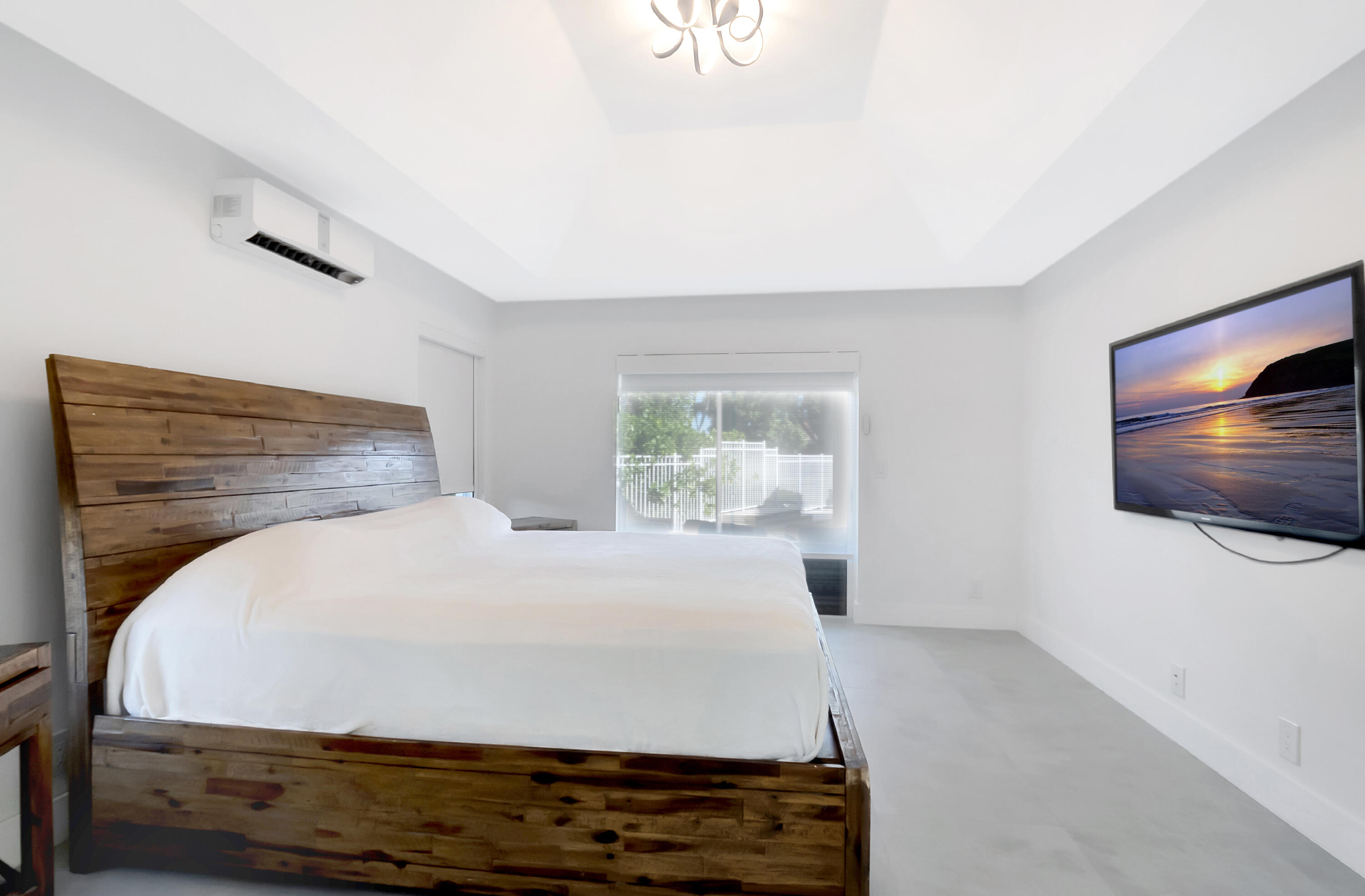 22330 Kettle Creek Way Boca Raton, FL 33428 - Photo 41 of 75 a bedroom with a bed and a flat screen tv