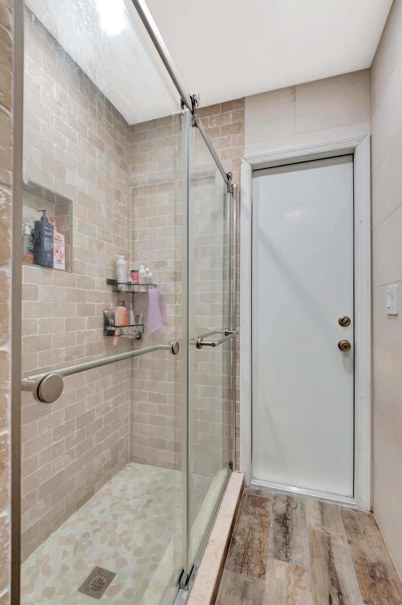 22330 Kettle Creek Way Boca Raton, FL 33428 - Photo 43 of 75 a bathroom with a glass shower door
